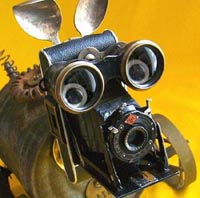 An old camera used to make the shape of a dog as art form
