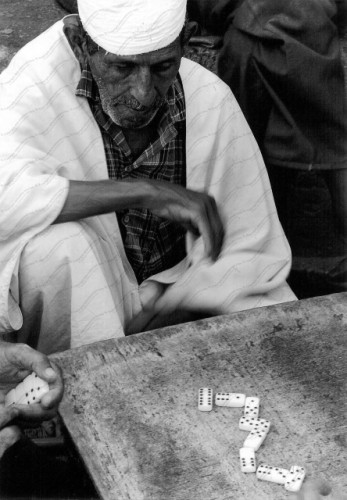 Old man playing domino in Algeria oasis